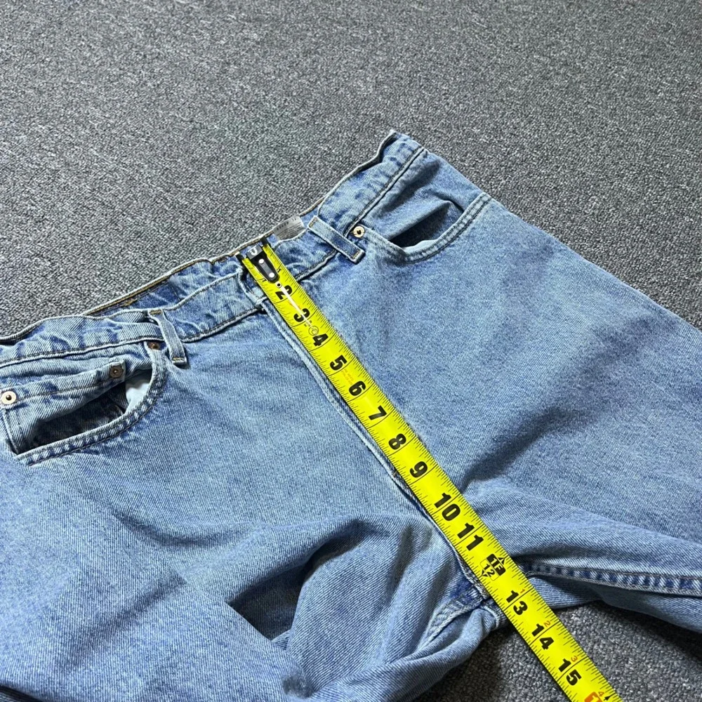 Vintage Levis 550 Relaxed Fit Tapered Leg Jeans 36x32 Blue Light Wash 90s USA